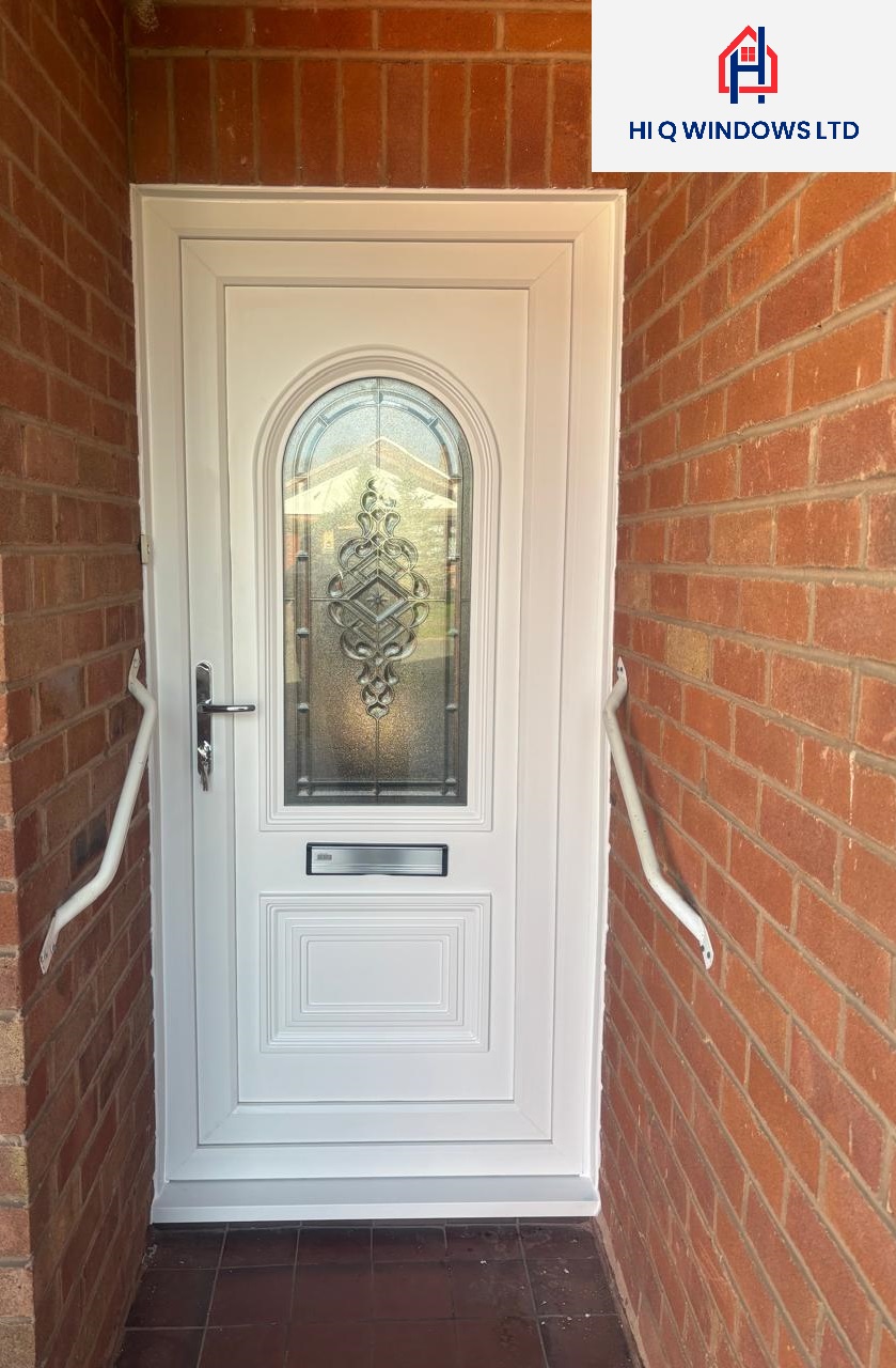 New white uPVC front door with glazed panel and letterplate