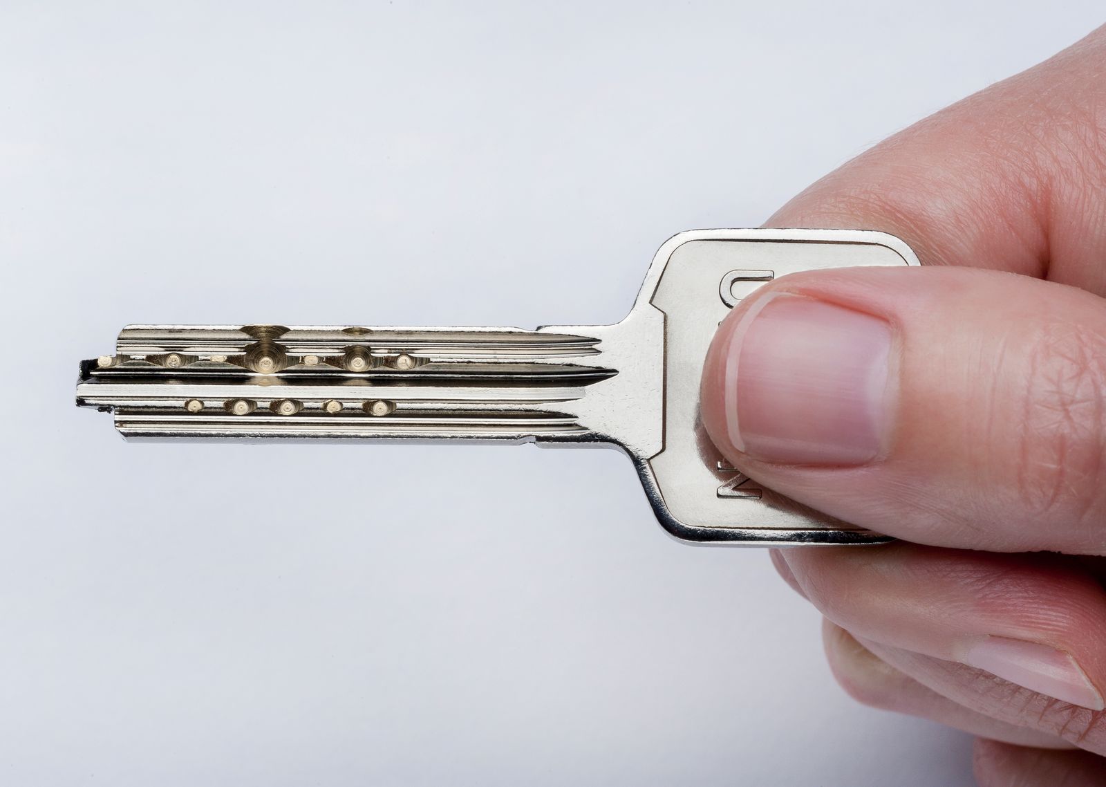 Ultion key held in hand